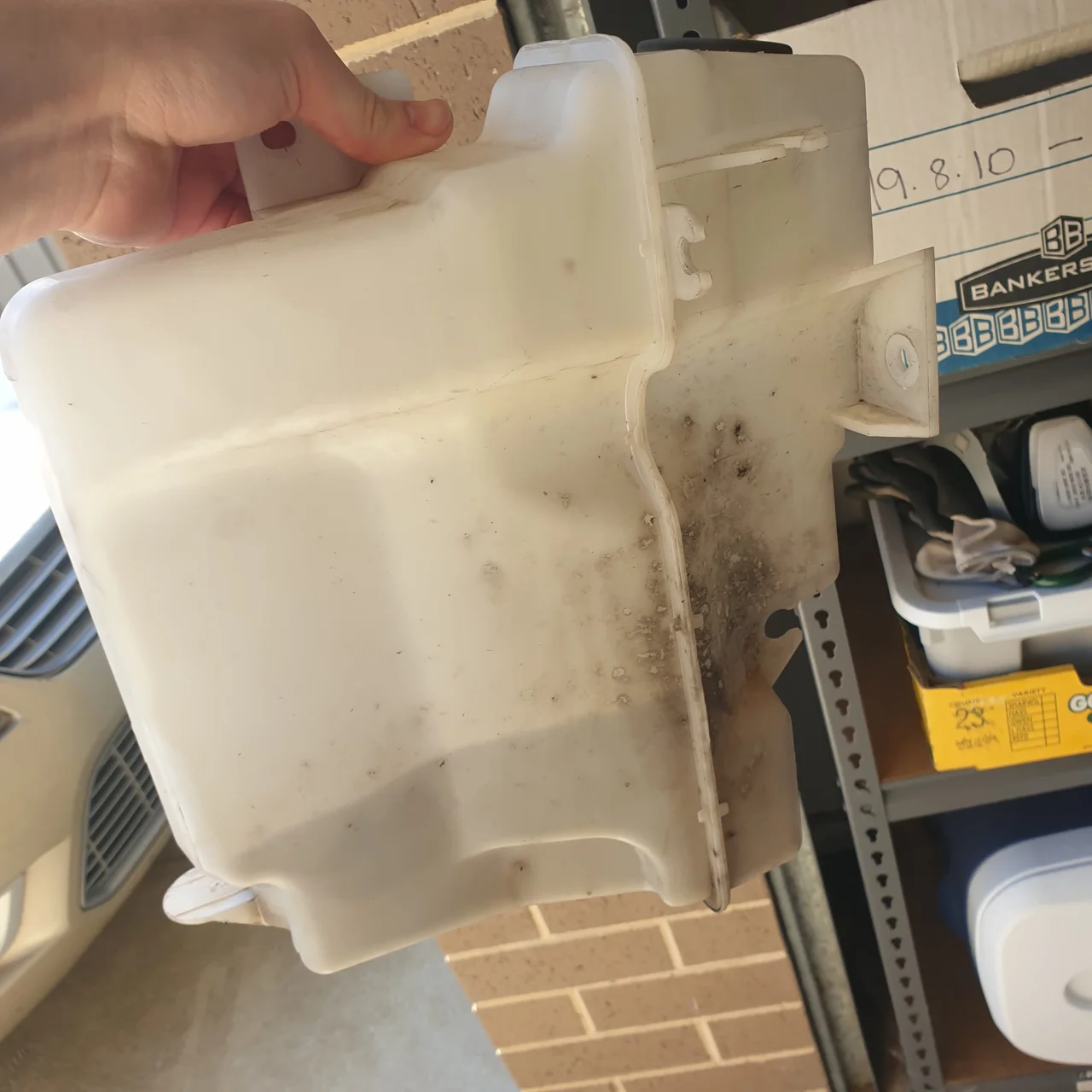Washer fluid container