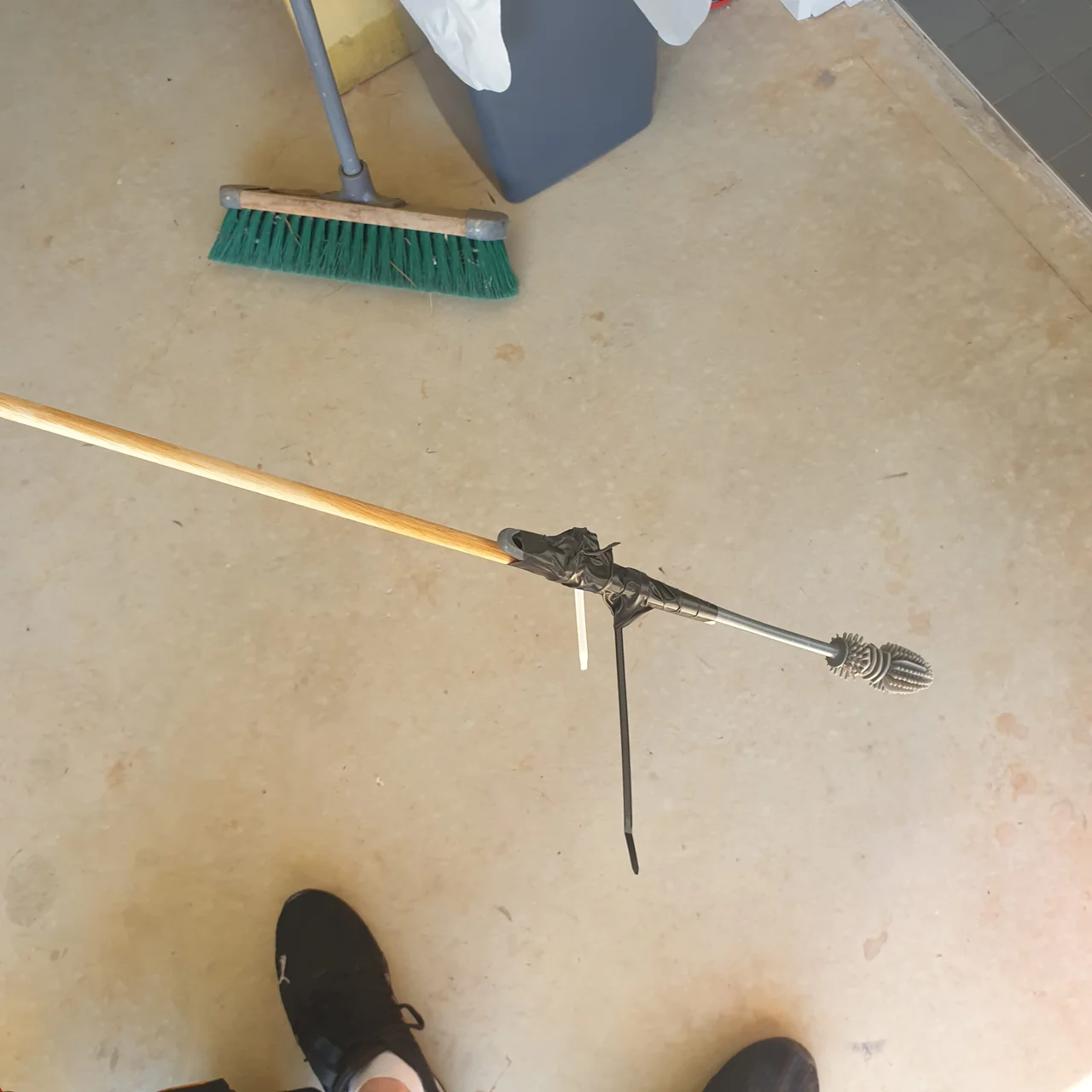 Tool to clean washer fluid container