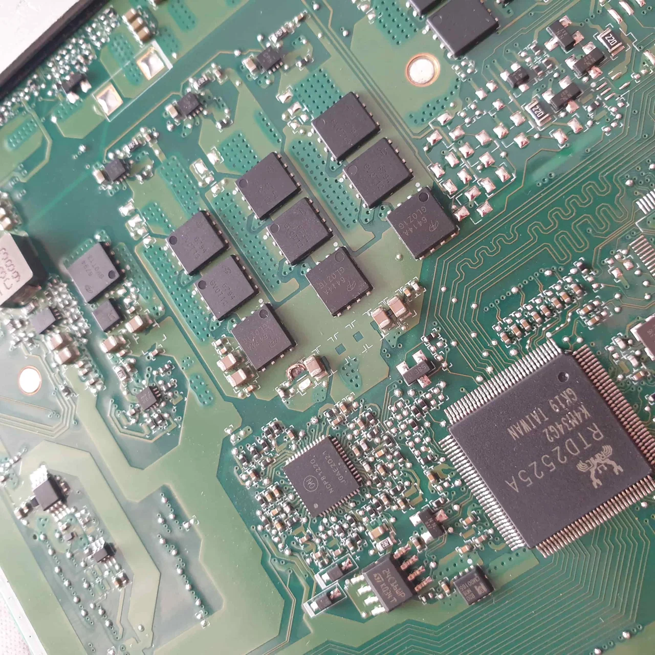 Motherboard with shorted capacitor removed