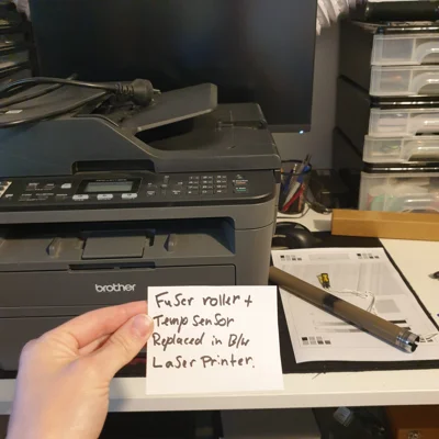 Replacing a fuser roller and temp sensor in a laser printer